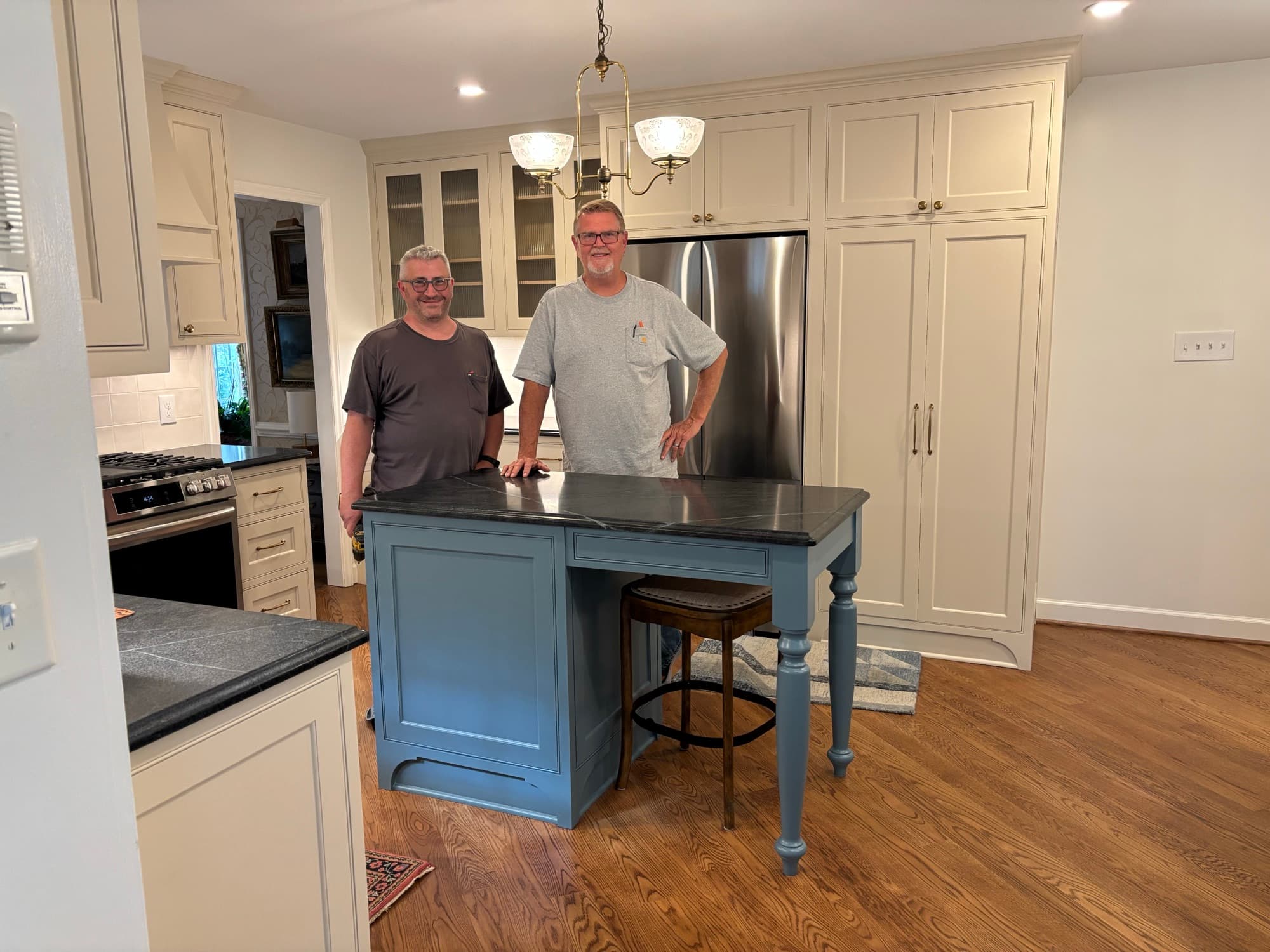 Jim Cooper and his crew in a finished kitchen