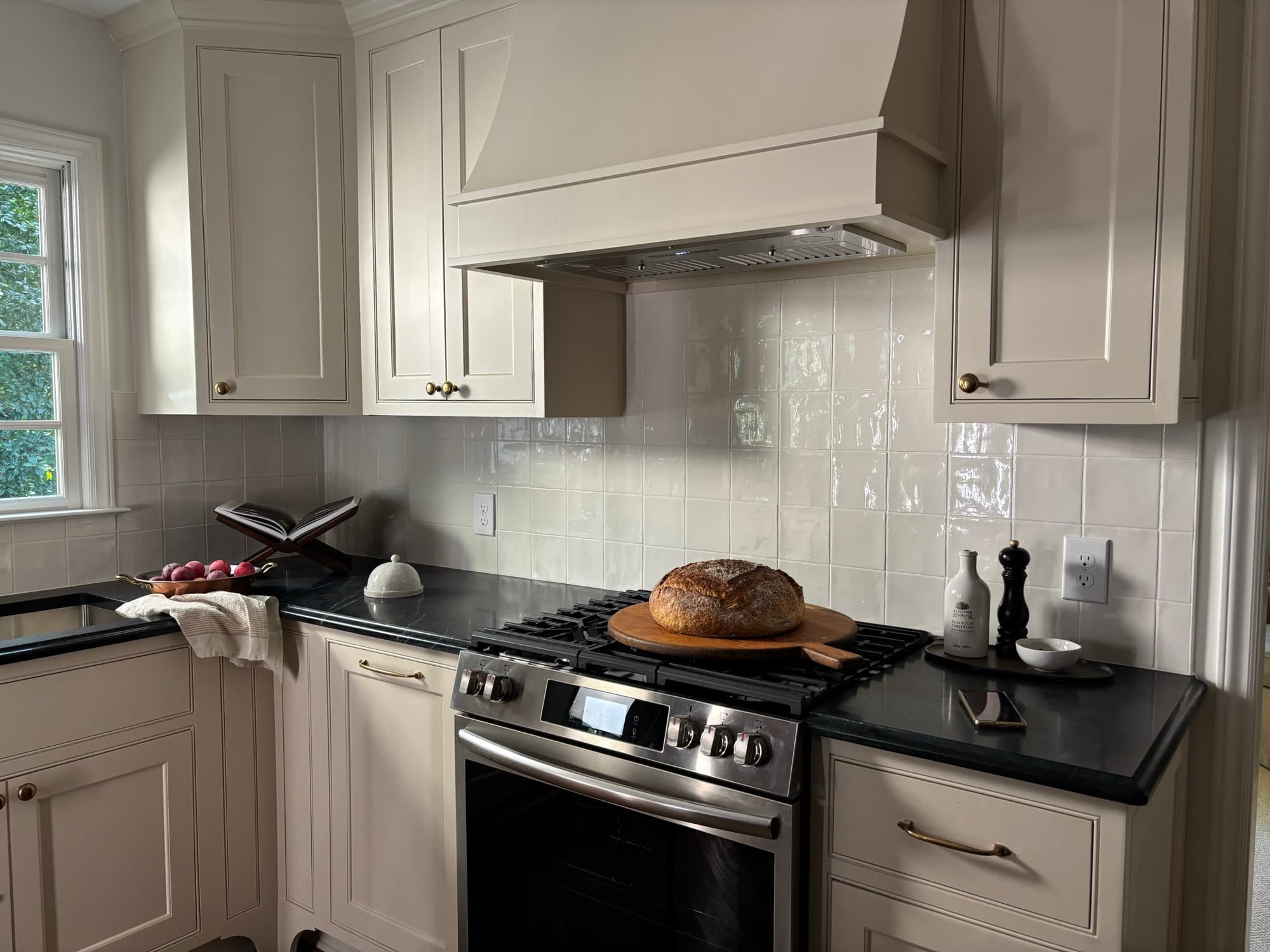 White shaker kitchen cabinets with granite countertops (placeholder photo, replace with a Cooper project)